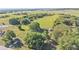 Expansive land featuring open fields, mature trees, and outbuildings, offering a serene, rural setting at 6981 Snell Rd, Bartow, FL 33830