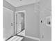 Empty laundry room with washer hook ups and marble floors at 6981 Snell Rd, Bartow, FL 33830