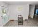 Cozy dining area featuring gray wood-look tile, a table, and lots of natural light at 7324 Thomas Jefferson E Cir, Bartow, FL 33830