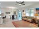 Open-concept living space with a dining area, and neutral contemporary furnishings at 7445 Ibis Dr, Lakeland, FL 33810