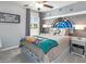 Charming bedroom with Star Wars themed decor, gray walls, plush carpet, and a ceiling fan at 7576 Sw 108 Th St, Ocala, FL 34476