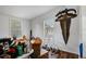 A room with an interesting alligator decoration, and other boxes and equipment at 900 Saddlewood Blvd, Lakeland, FL 33809