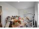 A packed room with boxes and a ladder next to the window at 900 Saddlewood Blvd, Lakeland, FL 33809