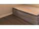Bedroom featuring a full bed on a platform base and wood-look floors at 1024 31St Nw St, Winter Haven, FL 33881