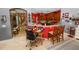Open-concept kitchen with a breakfast bar, stylish lighting, and modern appliances at 181 James Cir, Lake Alfred, FL 33850