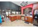 Spacious kitchen with tile flooring, modern appliances, and an adjacent dining area at 181 James Cir, Lake Alfred, FL 33850