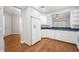 Bright kitchen with white cabinets, stainless steel appliances, and granite countertops at 2997 Mission Lakes Dr, Lakeland, FL 33803