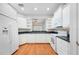 Classic kitchen with white cabinets, stainless steel appliances, and granite countertops at 2997 Mission Lakes Dr, Lakeland, FL 33803