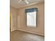 Cozy bedroom with soft carpeting, a ceiling fan, and a window at 4069 Byrds Crossing Dr, Lakeland, FL 33812