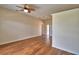 Spacious living room featuring hardwood floors, neutral walls, and lots of natural light at 4069 Byrds Crossing Dr, Lakeland, FL 33812