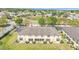 Aerial view showcases the community's well-maintained townhouses, green spaces, and convenient parking at 517 Sandstone St, Lakeland, FL 33809