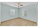 Bedroom with bright lighting and tile floors at 517 Sandstone St, Lakeland, FL 33809