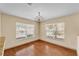 Cozy dining room featuring hardwood floors and natural lighting at 517 Sandstone St, Lakeland, FL 33809