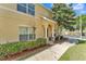 Inviting front entrance with manicured landscaping and classic architectural details at 517 Sandstone St, Lakeland, FL 33809