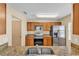 Well-equipped kitchen featuring granite countertops and stainless steel appliances at 517 Sandstone St, Lakeland, FL 33809