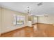 Bright living area with hardwood floors and multiple windows at 517 Sandstone St, Lakeland, FL 33809