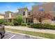 Inviting two-story townhome featuring well-maintained landscaping and a charming facade at 5407 River Rock Rd # 5407, Lakeland, FL 33809