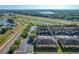 An aerial shot of a community with manicured landscaping, ponds, and easy highway access at 5458 Quarry Rock Rd, Lakeland, FL 33809