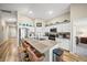 Well-lit kitchen with stainless steel appliances, granite countertops and barstool seating at 5543 Arlington River Dr, Lakeland, FL 33811