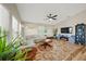 Spacious living room featuring lots of natural light and an inviting sectional sofa at 5543 Arlington River Dr, Lakeland, FL 33811