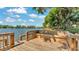 Dock on the water featuring seating and beautiful views at 6775 Lake Clark Dr, Lakeland, FL 33813