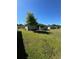 Large backyard offering ample space for gardening and recreation at 8181 Bristol Bay Ave, Lakeland, FL 33810