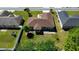 Aerial view of home's backyard featuring a fenced yard and patio, ideal for relaxation and outdoor enjoyment at 8181 Bristol Bay Ave, Lakeland, FL 33810