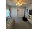 Neutral bedroom with carpet, featuring a daybed and two closets, offering cozy comfort at 8181 Bristol Bay Ave, Lakeland, FL 33810