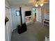 Neutral bedroom with carpet, featuring a dresser and two closets, offering cozy comfort at 8181 Bristol Bay Ave, Lakeland, FL 33810