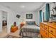 Comfortable bedroom featuring a nautical theme with a view to the living room at 955 Hunters Meadow Ln, Lakeland, FL 33809