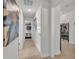 Hallway view into a bedroom and living spaces at 955 Hunters Meadow Ln, Lakeland, FL 33809