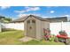 Well-maintained shed in backyard with lawn equipment nearby at 955 Hunters Meadow Ln, Lakeland, FL 33809