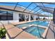 Enclosed pool and spa area for relaxation with patio and lounge areas at 140 Heritage Park Ln, Mulberry, FL 33860