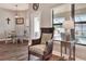 Cozy sitting area features a view to the outdoor pool at 140 Heritage Park Ln, Mulberry, FL 33860