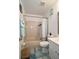 Cozy bathroom features a tub with shower, toilet, vanity with a sink, and tile floors at 1618 Crystalview Trl, Lakeland, FL 33801