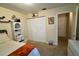 Bedroom features a closet, neutral walls, carpet, and stylish furnishings at 1618 Crystalview Trl, Lakeland, FL 33801