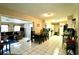 Open-concept kitchen and dining area with tile flooring and plenty of space at 1618 Crystalview Trl, Lakeland, FL 33801