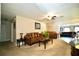 Spacious living room featuring neutral tones and comfortable seating arrangements at 1618 Crystalview Trl, Lakeland, FL 33801