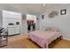 Cozy bedroom with hardwood floors, closet and decorative decor at 202 Saint Lucie Rd, Winter Haven, FL 33884