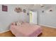 Comfortable bedroom with hardwood floors and decor at 202 Saint Lucie Rd, Winter Haven, FL 33884