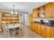 Inviting kitchen with dining table and display shelving at 202 Saint Lucie Rd, Winter Haven, FL 33884