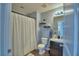 Bathroom features a tub and shower combination with modern fixtures at 6286 Manitoba Dr, Lakeland, FL 33805