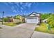 A well-maintained home with a spacious driveway and curb appeal at 6286 Manitoba Dr, Lakeland, FL 33805