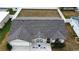 Aerial view of a single story home with a fenced backyard and well-maintained roof at 7968 Charleston Blvd, Lakeland, FL 33810