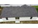 Aerial view of home and roof, back sliding door, and fenced yard at 7968 Charleston Blvd, Lakeland, FL 33810
