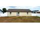 Backyard with a white vinyl fence providing privacy and security at 7968 Charleston Blvd, Lakeland, FL 33810