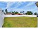 Spacious backyard with lush green grass and a privacy fence at 7968 Charleston Blvd, Lakeland, FL 33810