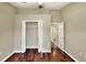 Bedroom with hardwood floors and closet space at 7968 Charleston Blvd, Lakeland, FL 33810