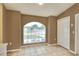 Dining area with natural light, tile flooring, and a closet for storage, creating a cozy space at 7968 Charleston Blvd, Lakeland, FL 33810