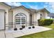 Charming home featuring updated landscaping and a well-maintained front yard at 7968 Charleston Blvd, Lakeland, FL 33810